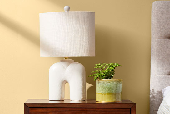 An eclectic assortment of lamps in colorful patterns & various textures.